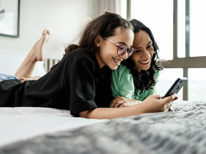 mother and daughter reading a book