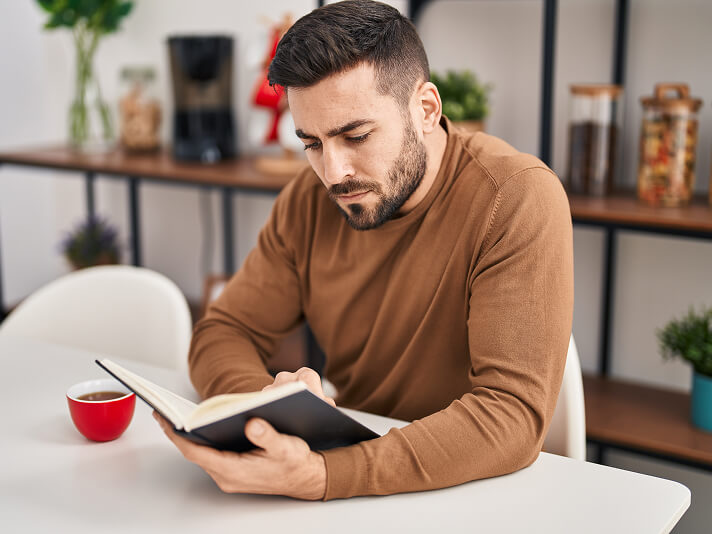 man reading a book